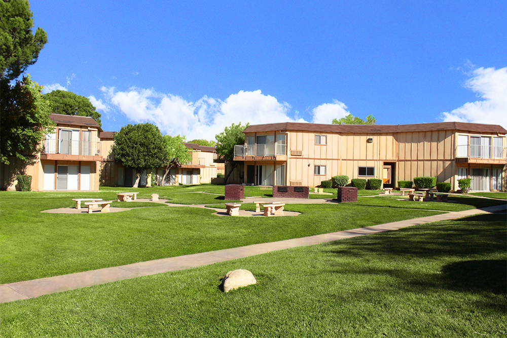 This image displays exterior photo of Mountain Shadows Apartments